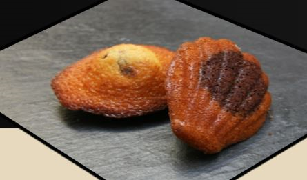 Dwie Magdalenki - francuskie ciastka o charakterystycznym muszelkowatym kształcie
